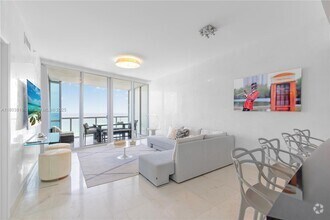Building Photo - 17121 Collins Ave