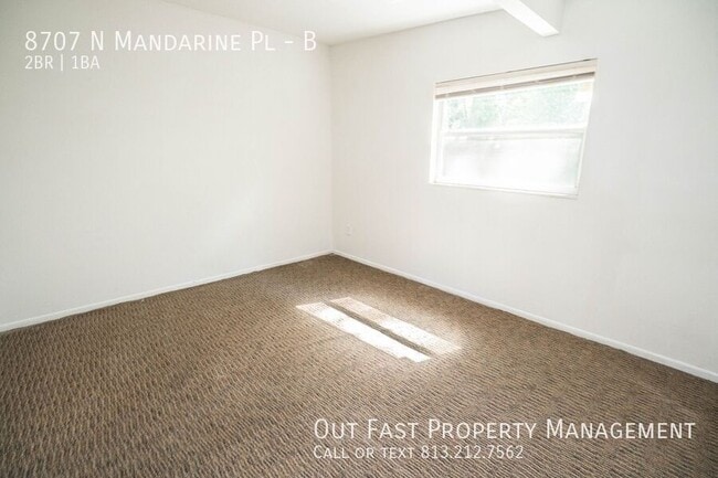Building Photo - 8707 N Mandarine Pl