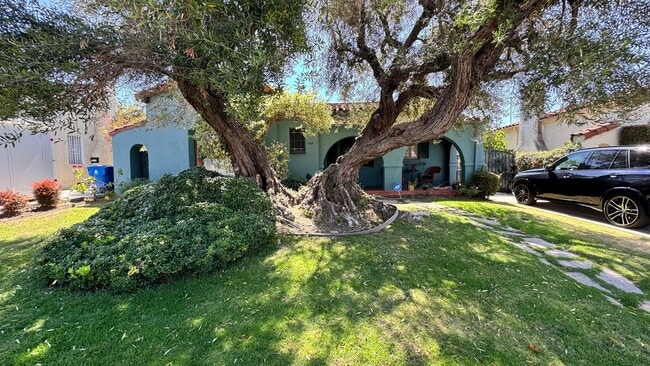 Building Photo - Beautiful Spanish Style Home with Lush Yard