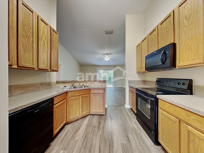 Building Photo - 6732 Gentle Oaks Dr