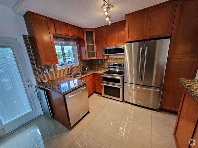 Building Photo - 733 NW 30th Ct