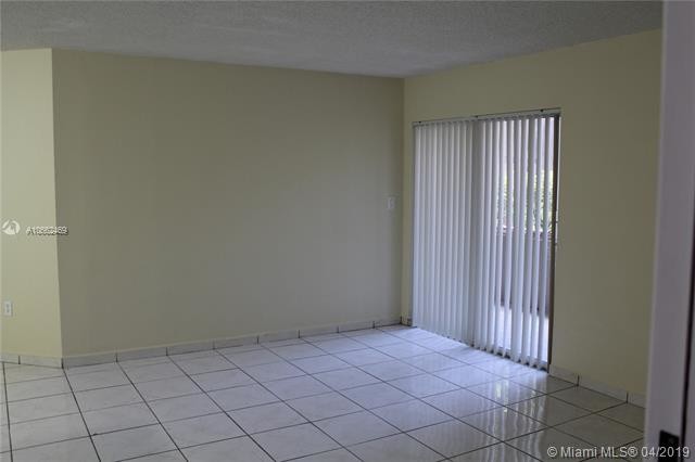 Building Photo - 4680 NW 102nd Ave  104-20