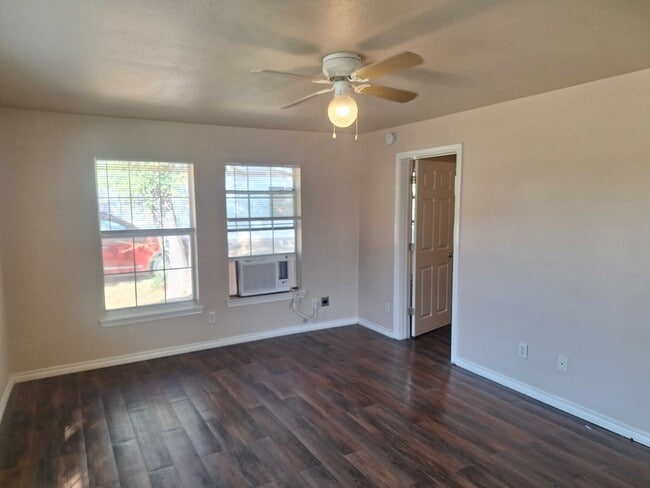 Building Photo - Affordable 2-1 Home with fenced in Back Yard