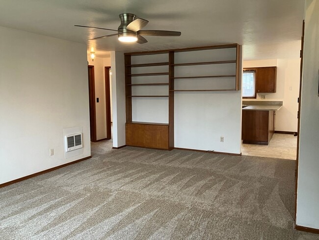 Building Photo - Charming Three Bedroom Home