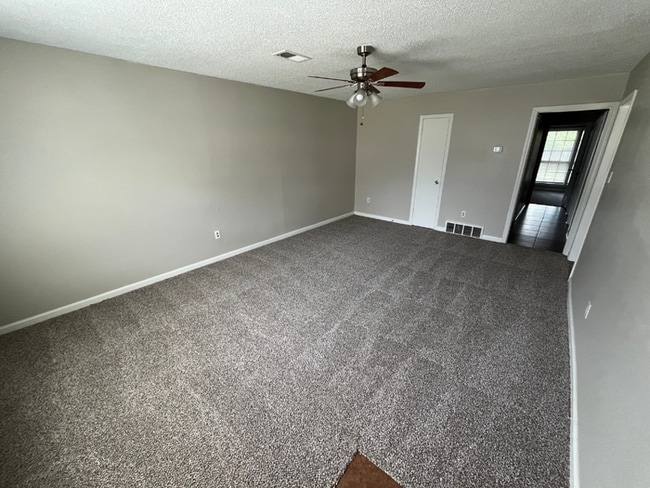 Photo - 3BR/2BA Memphis Rental with Bright Open Living Room & Fenced Yard House