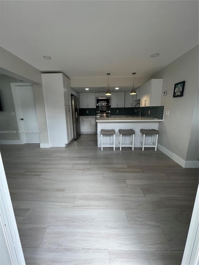 Building Photo - 15012 Royal Palm Ave