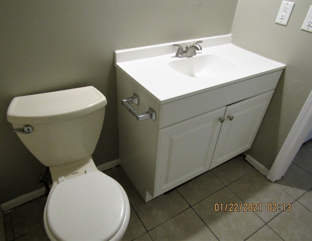 New toilet and vanity - 5322 Pinetree Ave