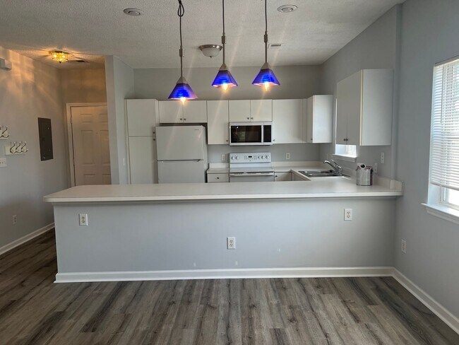 Building Photo - First Floor, End Unit, Two bedroom, Two ba...