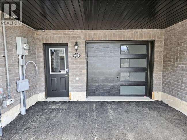 Building Photo - 205 Melody Ln