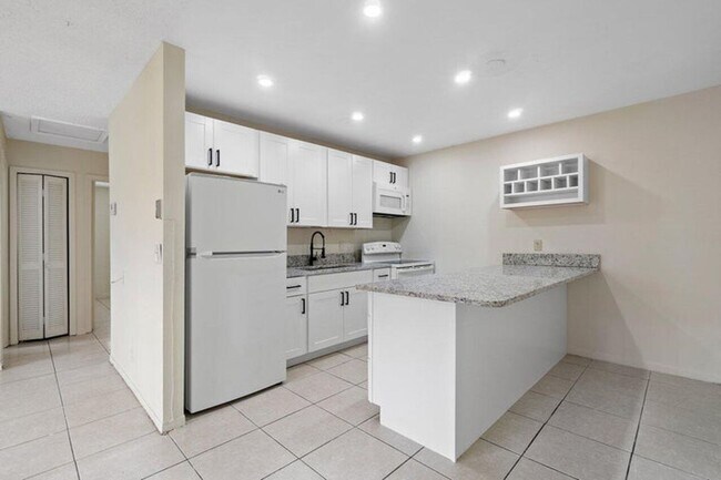 Foto del edificio - 5854 Kumquat Rd