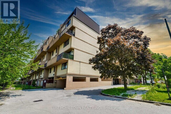 Photo du bâtiment - 665-665 Kennedy Rd