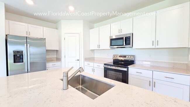 Foto del edificio - BRAND NEW 4 BEDROOM HOME AT SEAAIRE PARRIS...