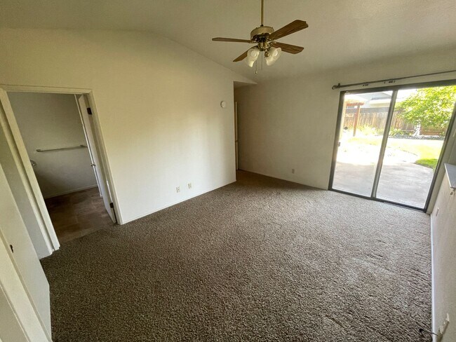 Building Photo - Central Chico, 3/2 fenced yard, 2 car garage, Gardener included, Solar, Fireplace, Craftsman Pergola