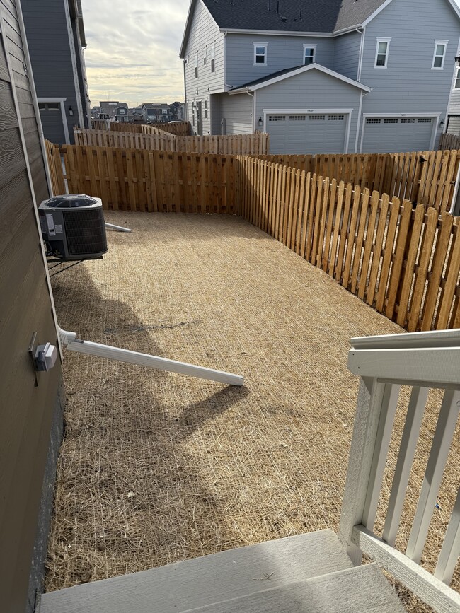 Fenced side yard - 13518 E 111th Ave