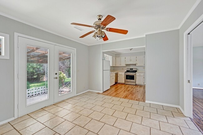 Dining area open to kitchen - 5017 W Durrett Dr