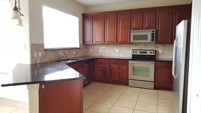 Foto del edificio - Elegant 4-Bedroom Home in Gated Eagle Creek with Resort-Style Amenities