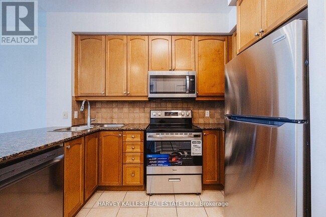 Photo du bâtiment - 80 Absolute Ave