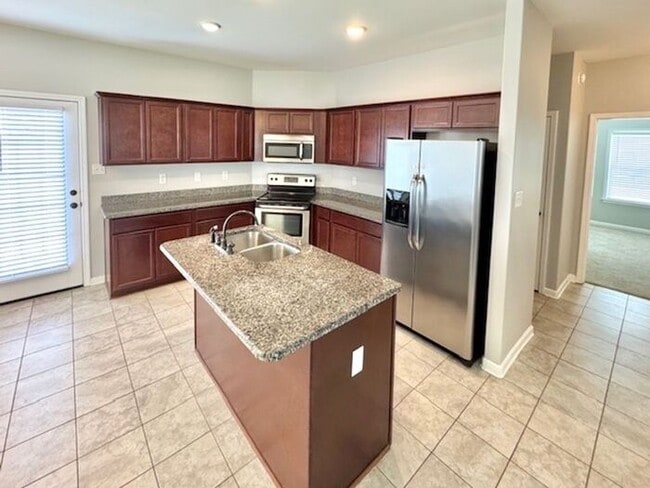 Building Photo - Available Now! 4-Bedroom 2.5 Bath Home In ...