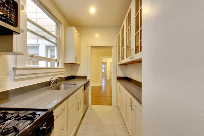 Photo - 2BR. Private Patio! Parking! DISHWASHER! On-Site LAUNDRY! HARDWOOD! Apartment