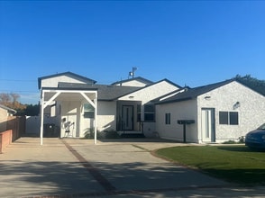 Building Photo - 10430 Densmore Ave