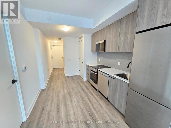 Building Photo - 7439 Kingston Rd