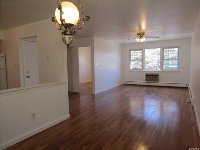 Building Photo - 212-72 16th Ave
