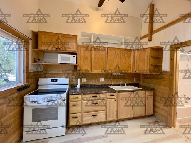 Foto del edificio - Cozy 1-Bedroom Loft Home with Office & Cov...