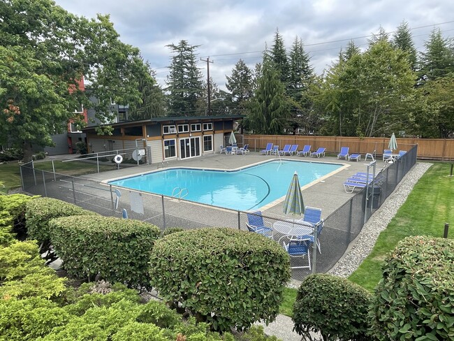 view of swimming pool and cabana - 7001 Sand Point Way NE