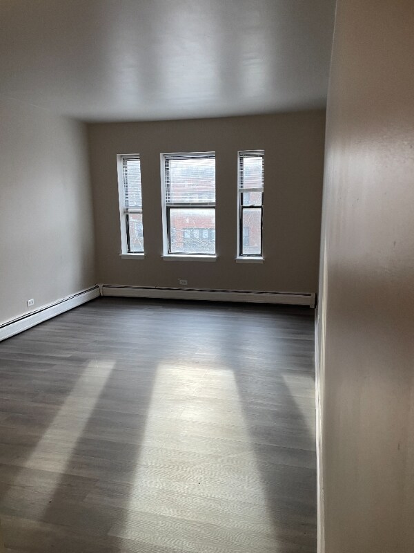 Building Photo - 6811 S Paxton Ave