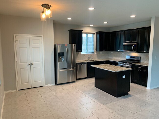 Foto del edificio - *COMING SOON* MOVE IN SPECIAL Spacious 4-Bedroom Home Near Briggs Ranch – Loft, Covered Patio & M...