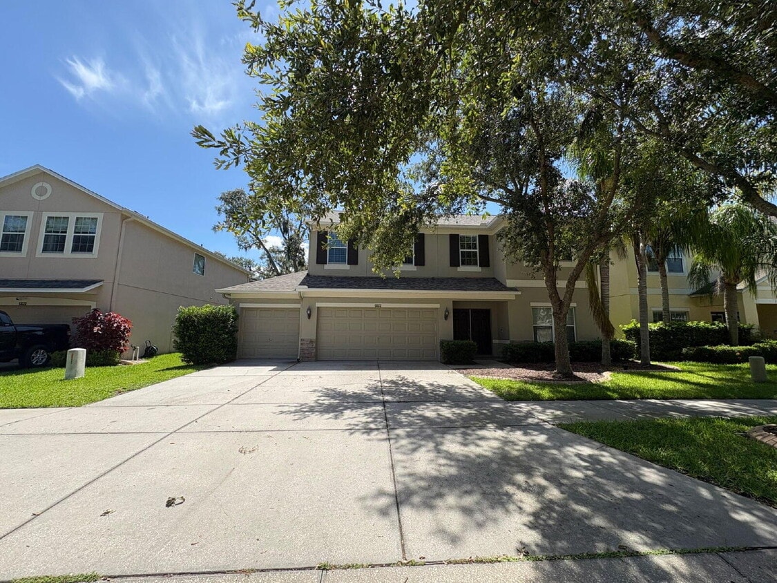 Primary Photo - Spacious 5-Bedroom Pool Home with Putting ...