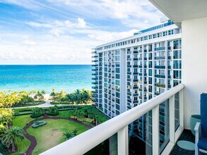 Building Photo - 10275 Collins Ave