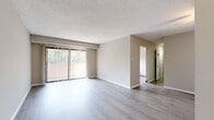 Located at 314 Echelon Rd in Voorhees, NJ, this single-floor residence offers three bedrooms and two bathrooms within a thoughtfully designed layout. The open living area is anchored by light wood-look flooring, neutral-toned walls, a textured ceiling, and a large sliding glass door fitted with vertical blinds that draw in natural light and provide outdoor views. A ceiling fan adds comfort to the adjacent space, which connects seamlessly to the rest of the home via hallways.

The kitchen is a functional highlight, featuring rich dark-brown cabinetry, light quartz-style countertops, a gray tile backsplash, and stainless steel appliances including a gas range, microwave, and dishwasher. A window above the sink brings in additional natural light.

The bedrooms are carpeted and bathed in neutral tones, with windows overlooking greenery. The primary bedroom offers a comfortable footprint, while additional bedrooms include closet storage. Both bathrooms are finished with gray tile flooring, white vanities with mirrored medicine cabinets, and clean, minimalist fixtures. A dedicated closet provides extra storage. The overall ambiance is clean, modern, and move-in ready.