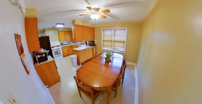 Building Photo - 3D Tour Available! Huge House with Two Kitchens + Fenced-in Yard + Washer & Dryer! Available Augu...
