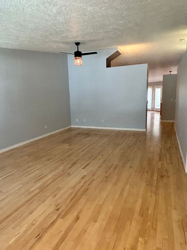 Building Photo - Spacious Duplex with 3-Car Garage & Private Patio!