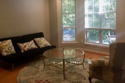 Living room bay window. Tons of natural light - 415 Mather Green Ave