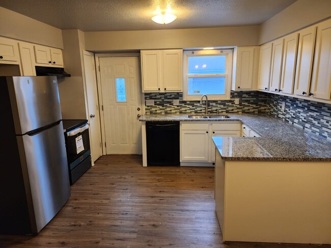 Renovated kitchen. New cabinets, granite countertop - 2234 Rockspring Rd