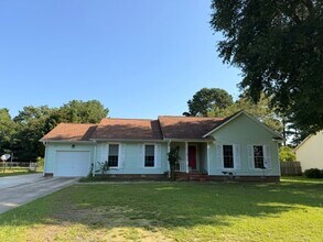 Building Photo - 6816 Woodmark Dr