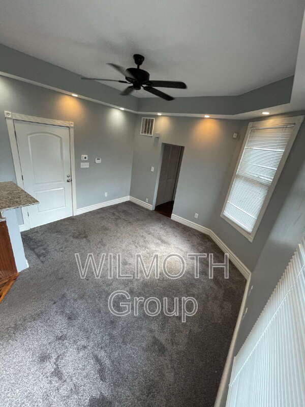 Photo - 410 E 16th St Apartment