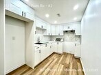 Photo principale - Welcome home to this warm and inviting low...