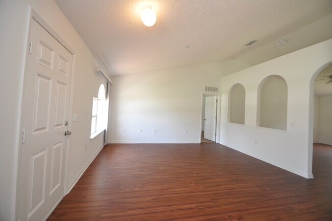 Building Photo - "Spacious 4-Bed Oasis in Palm Coast – Your...