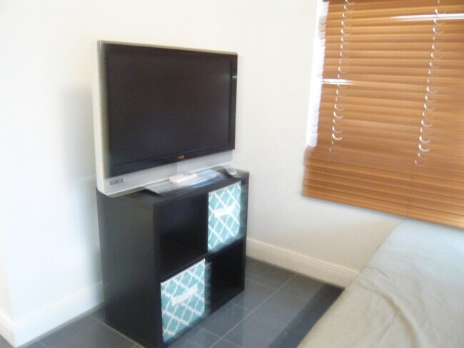 Smart TV and stands with drawers - 1001 NE 88th St