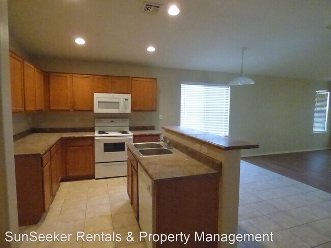 Building Photo - 4 br, 2 bath House - 8853 W Watkins St
