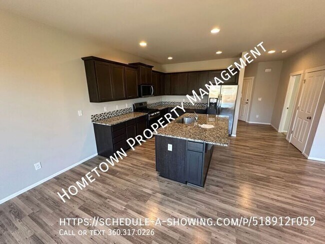 Foto del edificio - 6918 Honeylocust Ct NE