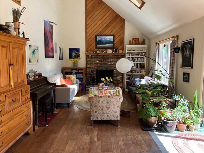 Great room with large brick fireplace - 57 Stone Ledge Rd