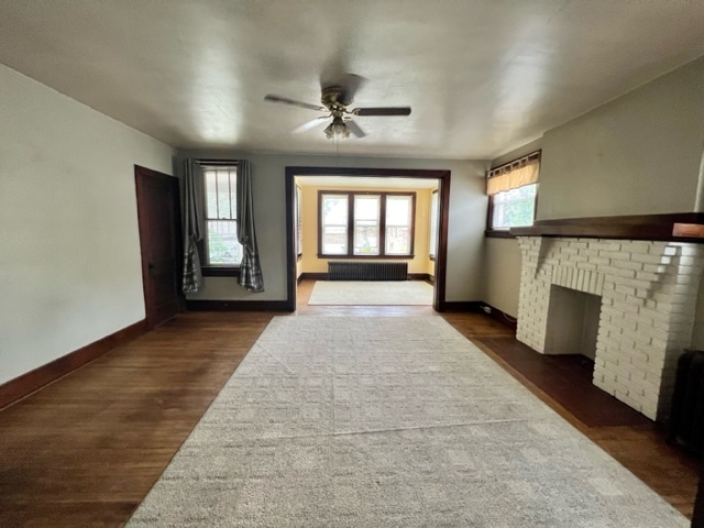 View from living room into the sunroom - 180 Noble Ave