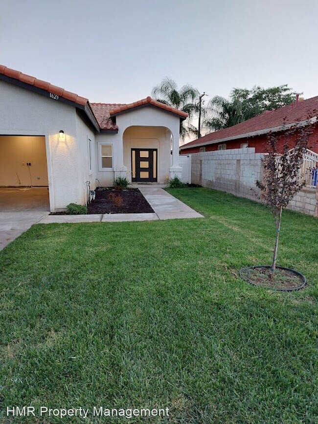 Building Photo - 4 br, 2 bath House - 1623 W. Congress St.