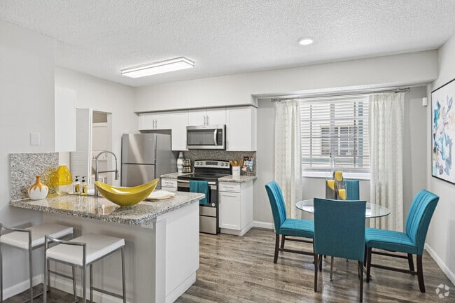 2BR, 2BA - 1165SF - Kitchen And Dining Room - The Emerson Apartments