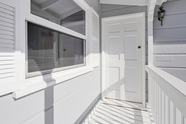 upstairs porch and front door - 423 28th St