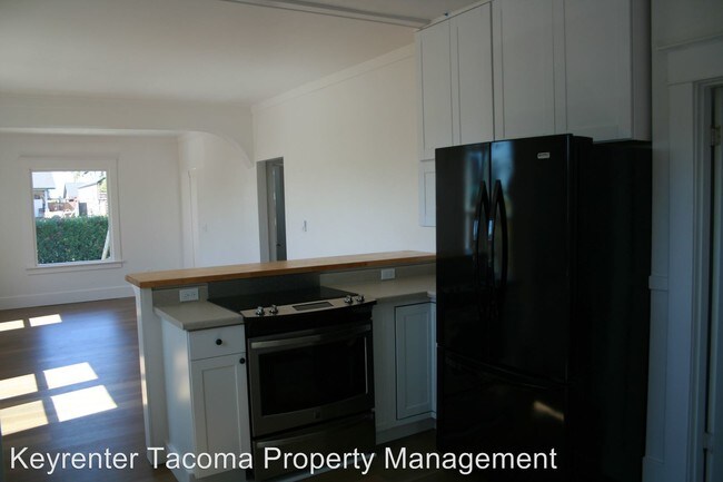 Building Photo - 3 br, 1 bath House - 6441 S Puget Sound Ave